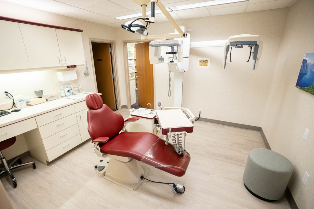 Orthodontic treatment room at Kittleson Orthodontics in Mequon, featuring a modern dental chair, digital equipment, and a clean, welcoming environment for patients seeking braces and orthodontic care.