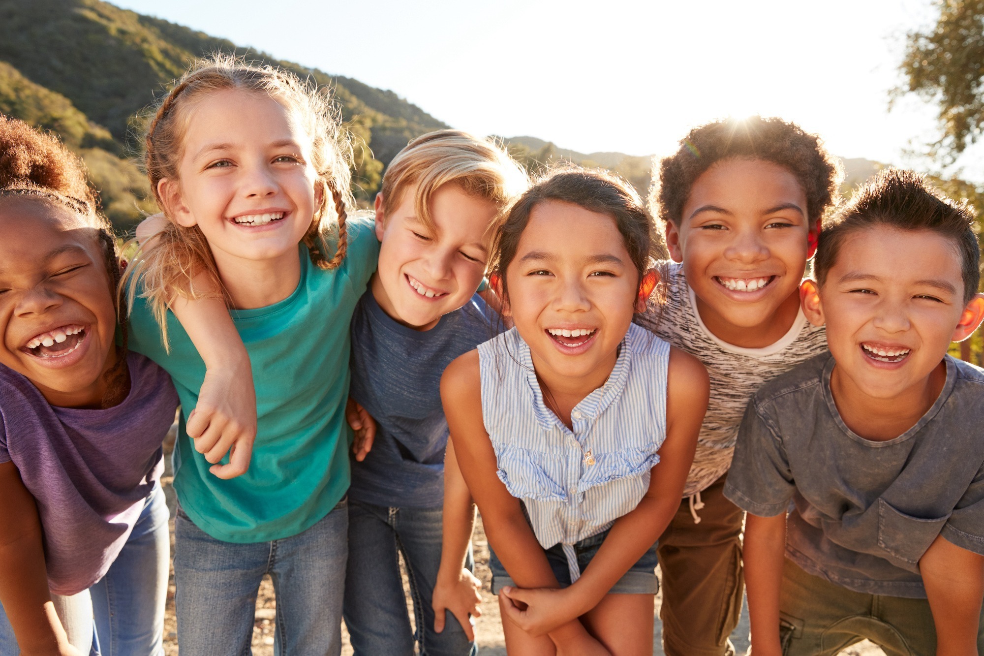 Happy patient smiling after orthodontic treatment at Kittleson Orthodontics in Mequon, WI